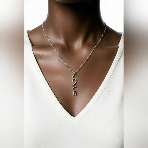 Coa ch Silver-Tone Vertical Logo Pendant Necklace - Picture 6 of 7